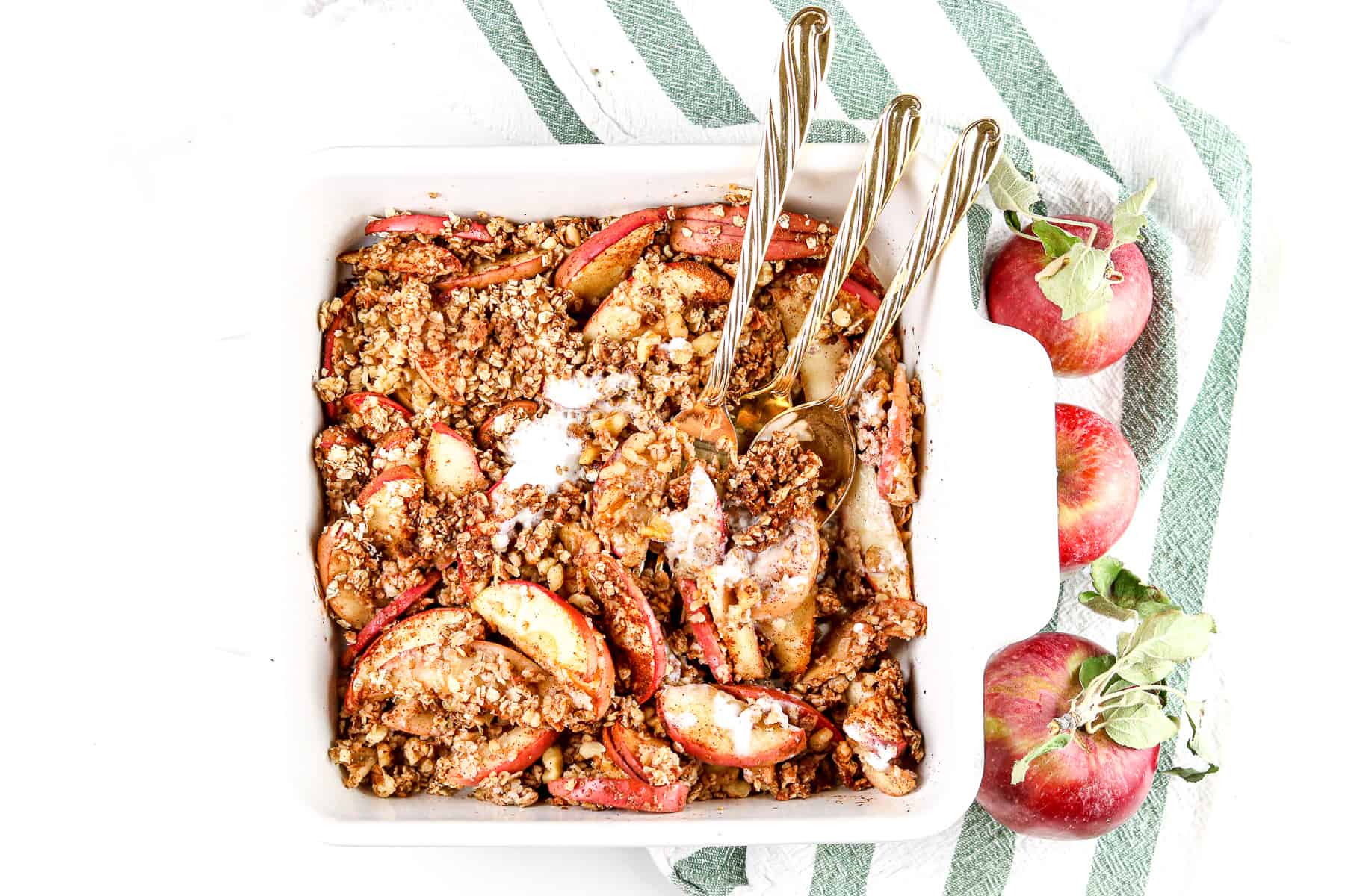 Image of apple crisp with forks. 