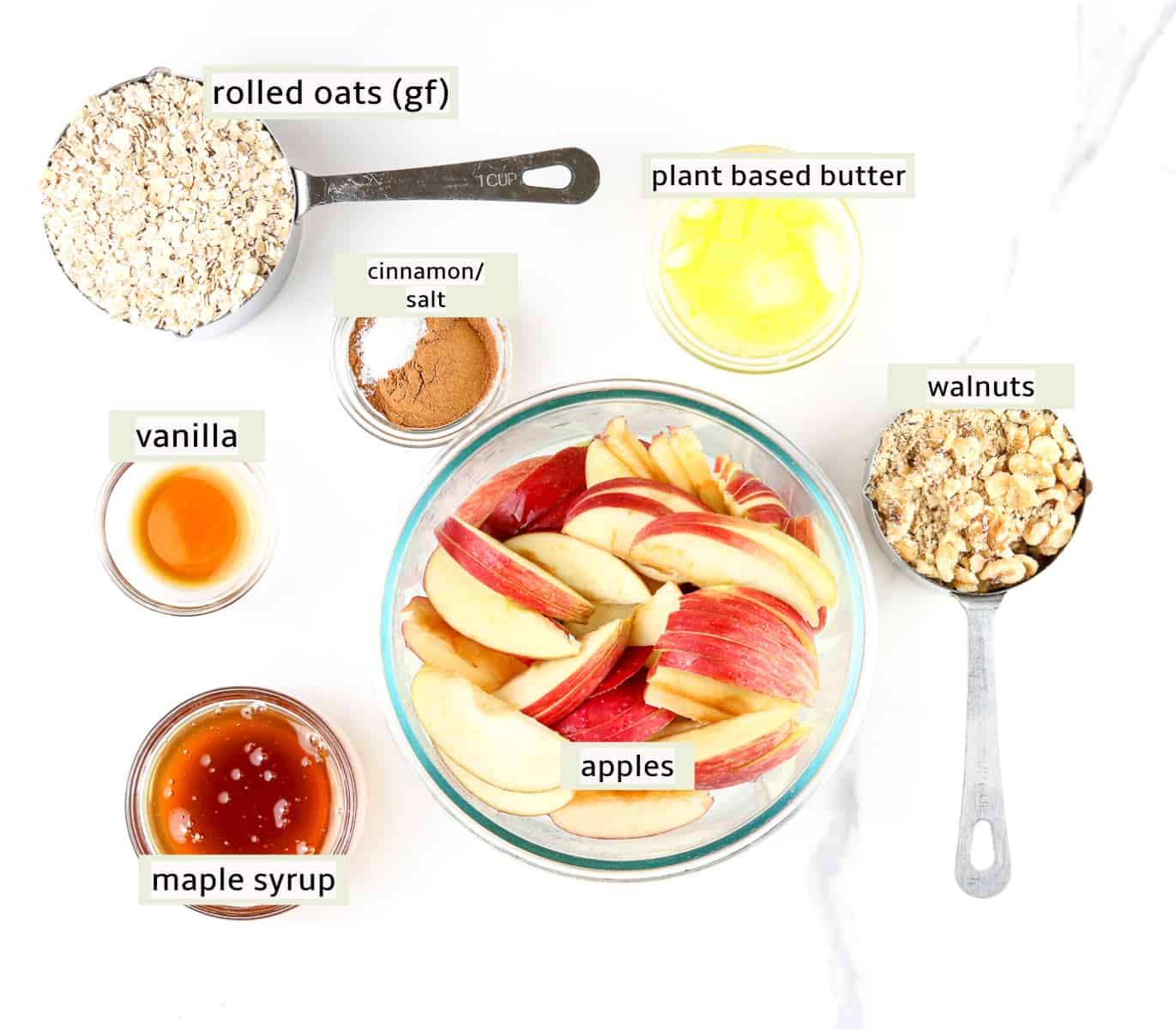 Ingredients needed to make apple dessert.