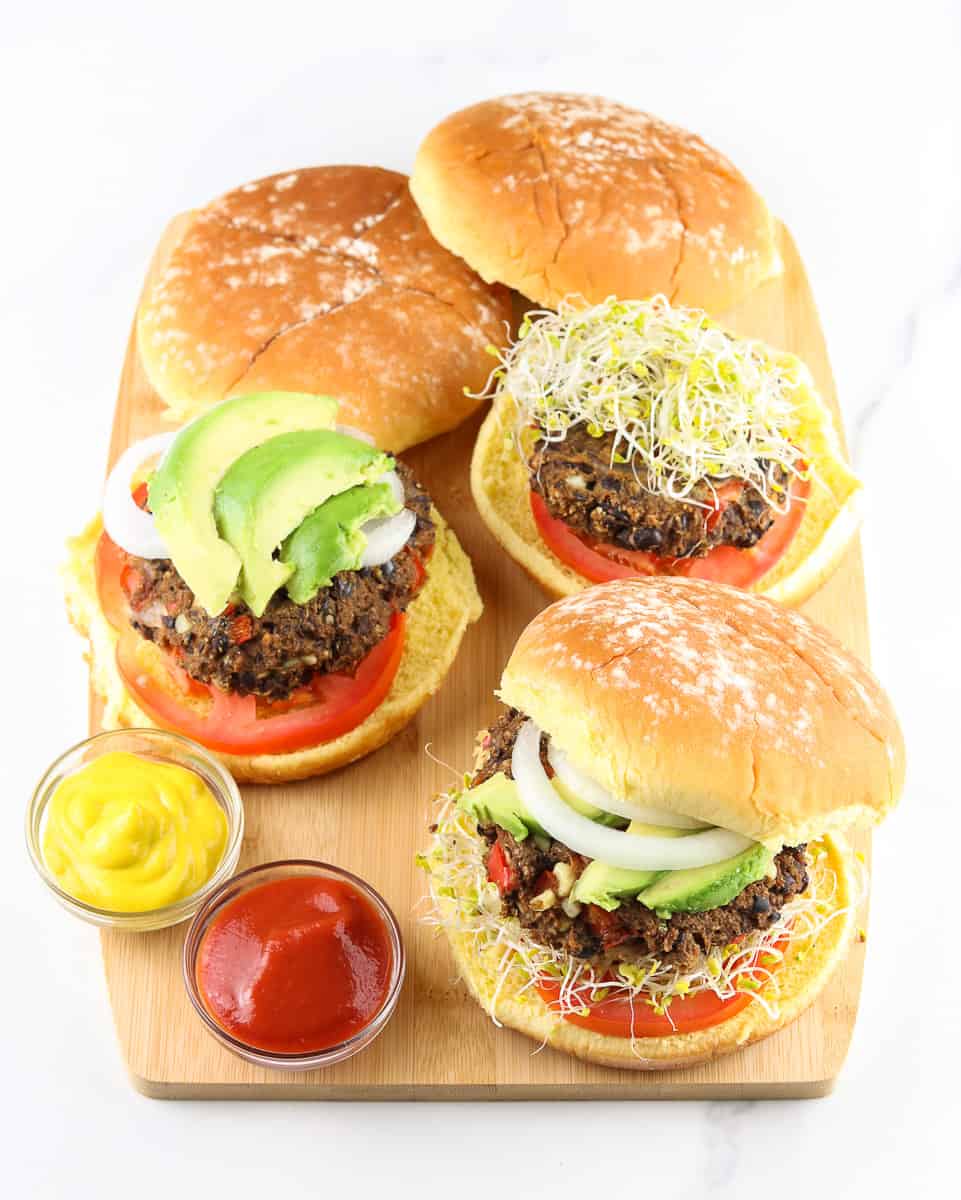 Cutting board with black bean burgers.