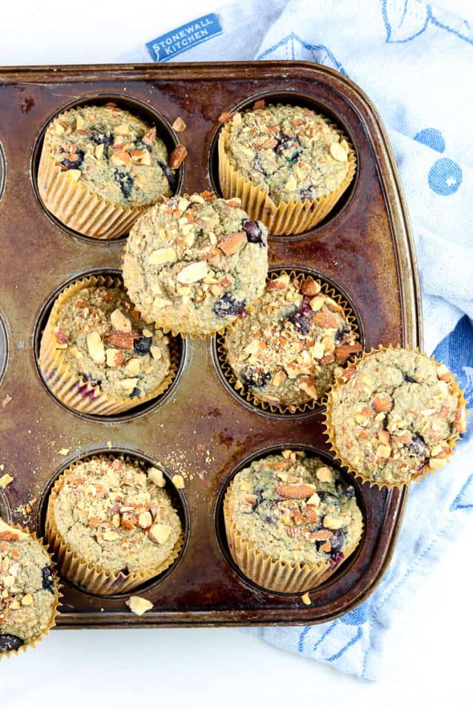 Vertical image of blueberry muffins. 