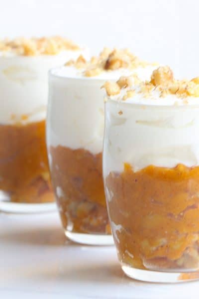 Image of 3 sweet potato breakfast parfaits lined up in a row.