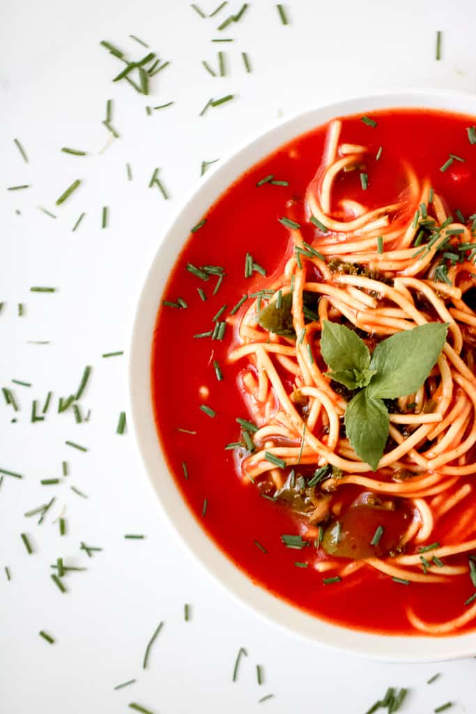 Tomato Soup Pasta with Kale is a simple, vegan dish that the entire family can enjoy. Make It from scratch or simple swap some time with using a canned soup. Either way, the end product is delicious! You'll also find suggestions to modify for a gluten-free diet and high protein soup. #tomatosoup #healthytomatosoup #vegansouprecipes