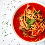 Tomato Soup Pasta with Kale is a simple, vegan dish that the entire family can enjoy. Make It from scratch or simple swap some time with using a canned soup. Either way, the end product is delicious! You'll also find suggestions to modify for a gluten-free diet and high protein soup. #tomatosoup #healthytomatosoup #vegansouprecipes