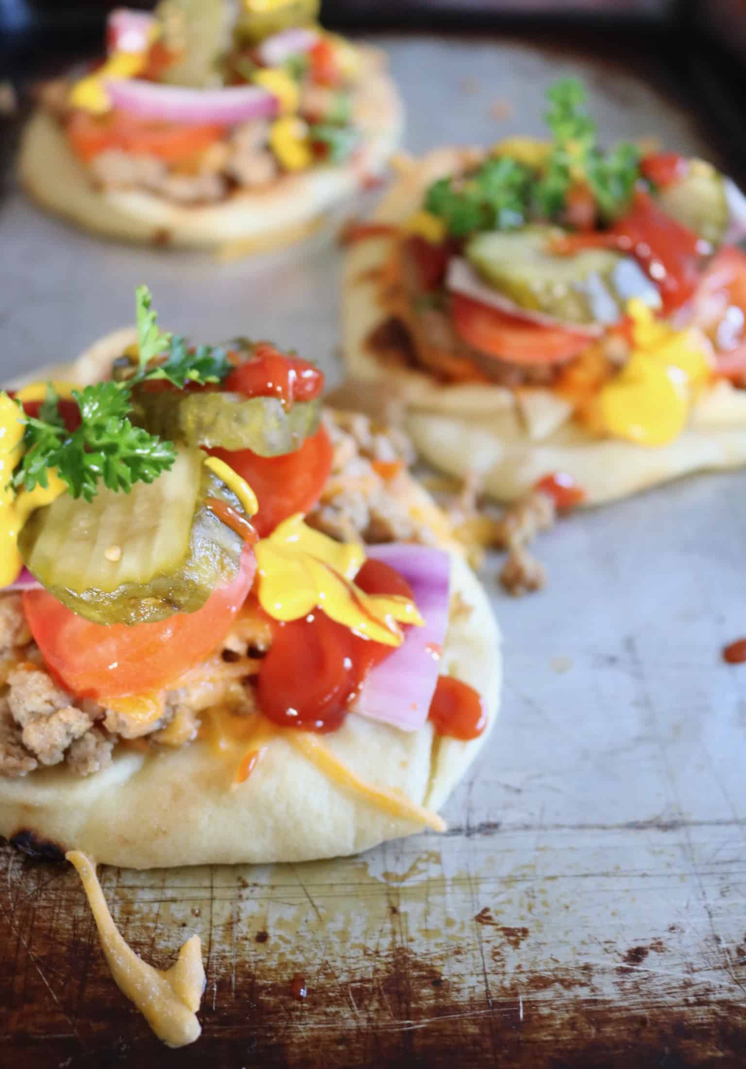 Cheeseburger Naan Pizza - A healthier way to enjoy two of your favorite comfort foods! @shawsimpleswaps