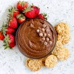 A rich, creamy chocolate dessert dip made with the essential ingredients you likely have on hand! This Sweet Hummus Recipe is the perfect snack or party dip! The beauty of this baby is you can make it all in the blender, aka, no mess clean up! #desserthummus #desserthummusrecipe #healthydesserthummus #desserthummushealthyrecipe #desserthummuschocolate