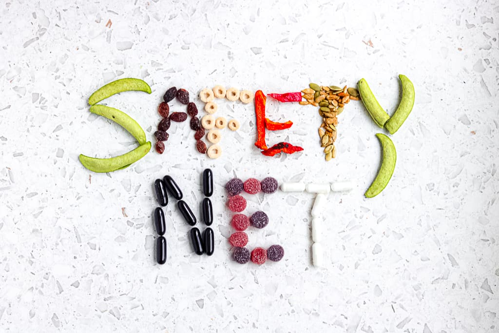 Picture of food spelling out supplement safety net.