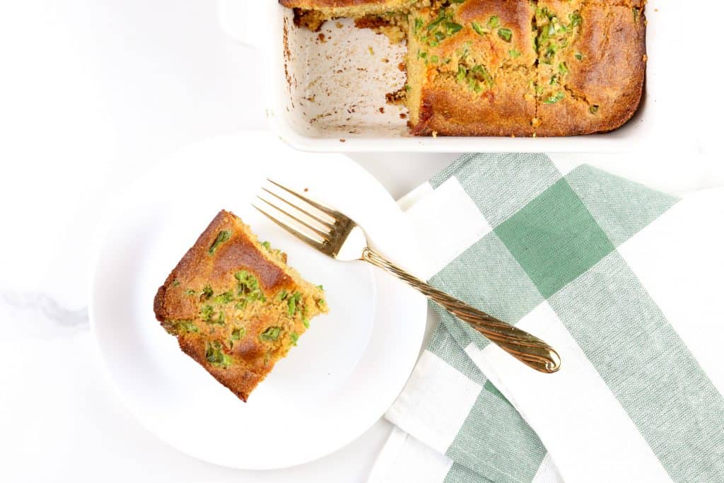 Image of hatch chile healthy cornbread cut into a square. 