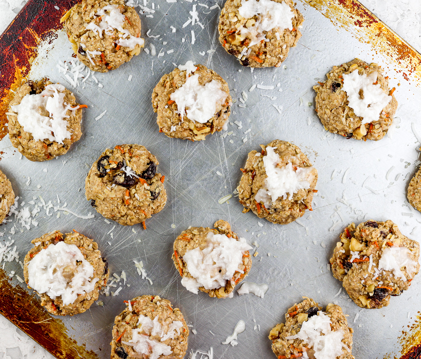 Cookies lined on a baking sheet.